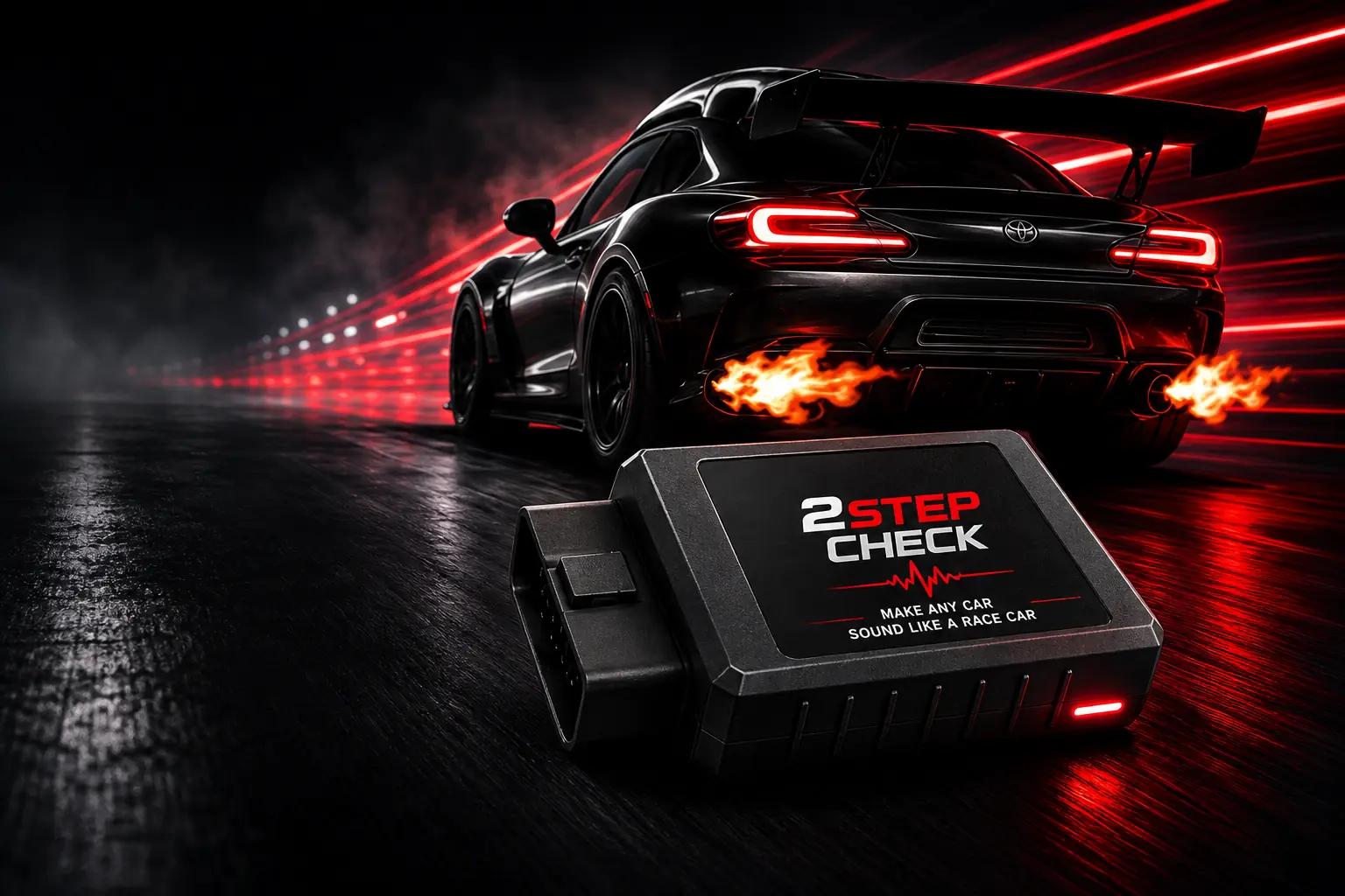 The clear-case 2StepCheck OBD-II device in front of a black sports car with flames from the exhausts on a wet city street at night